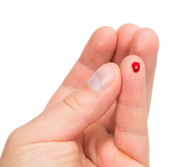 Bead of blood after a finger-prick