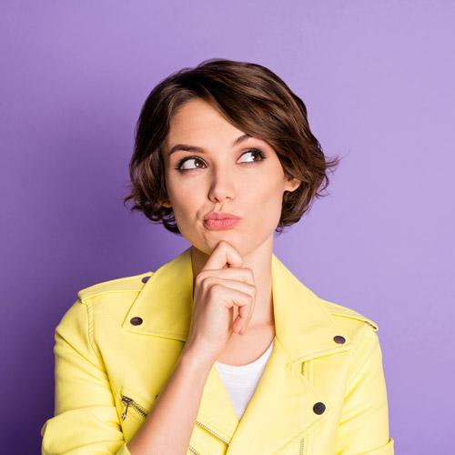 Woman making a decision about a finger-prick or venous blood test