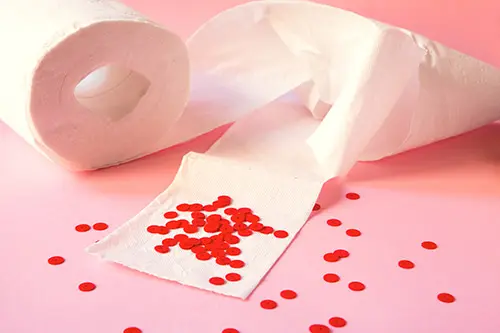 Blood drops on toilet paper